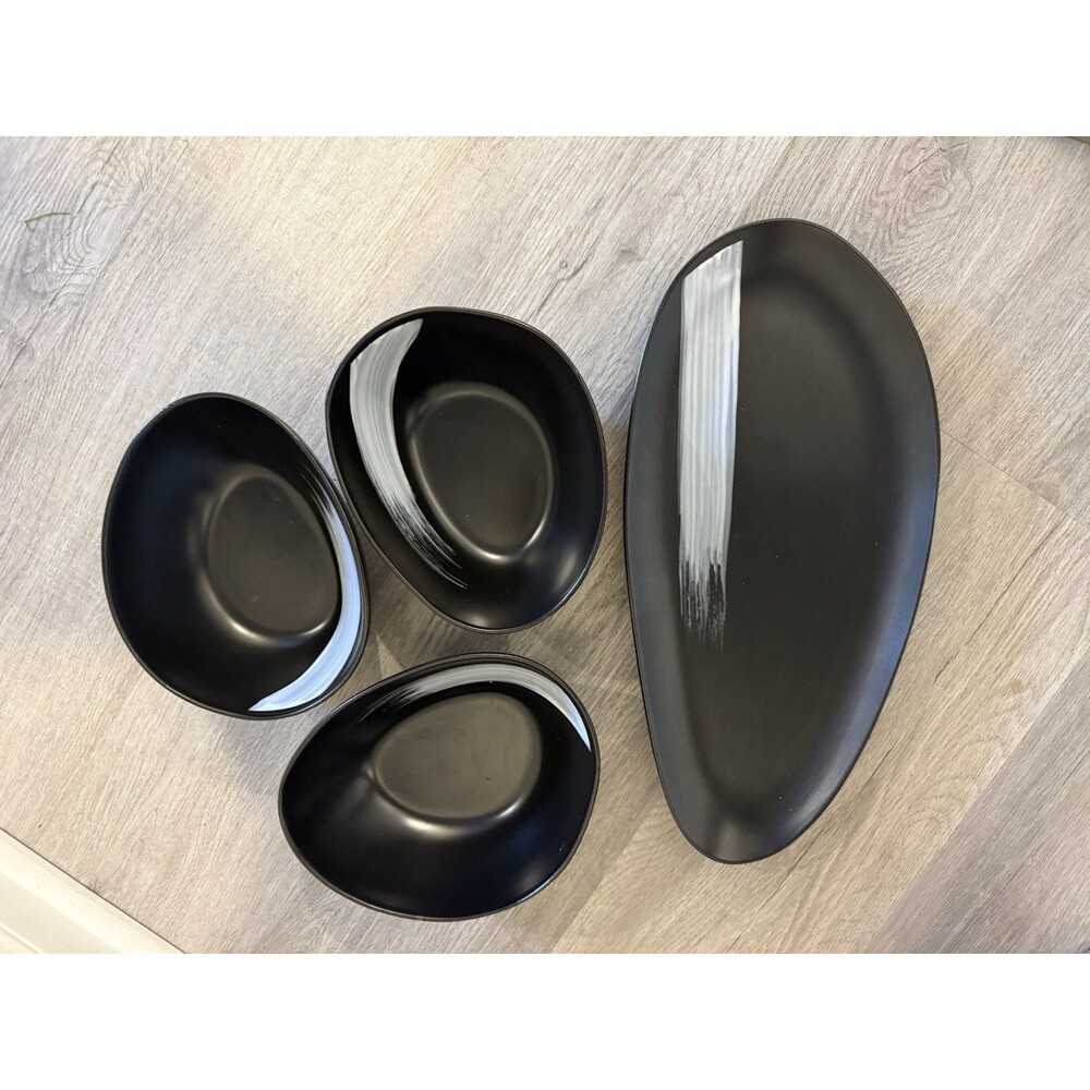4 Oval Matte Black Dinning Set Organic Stone With A striking Hand Painted White